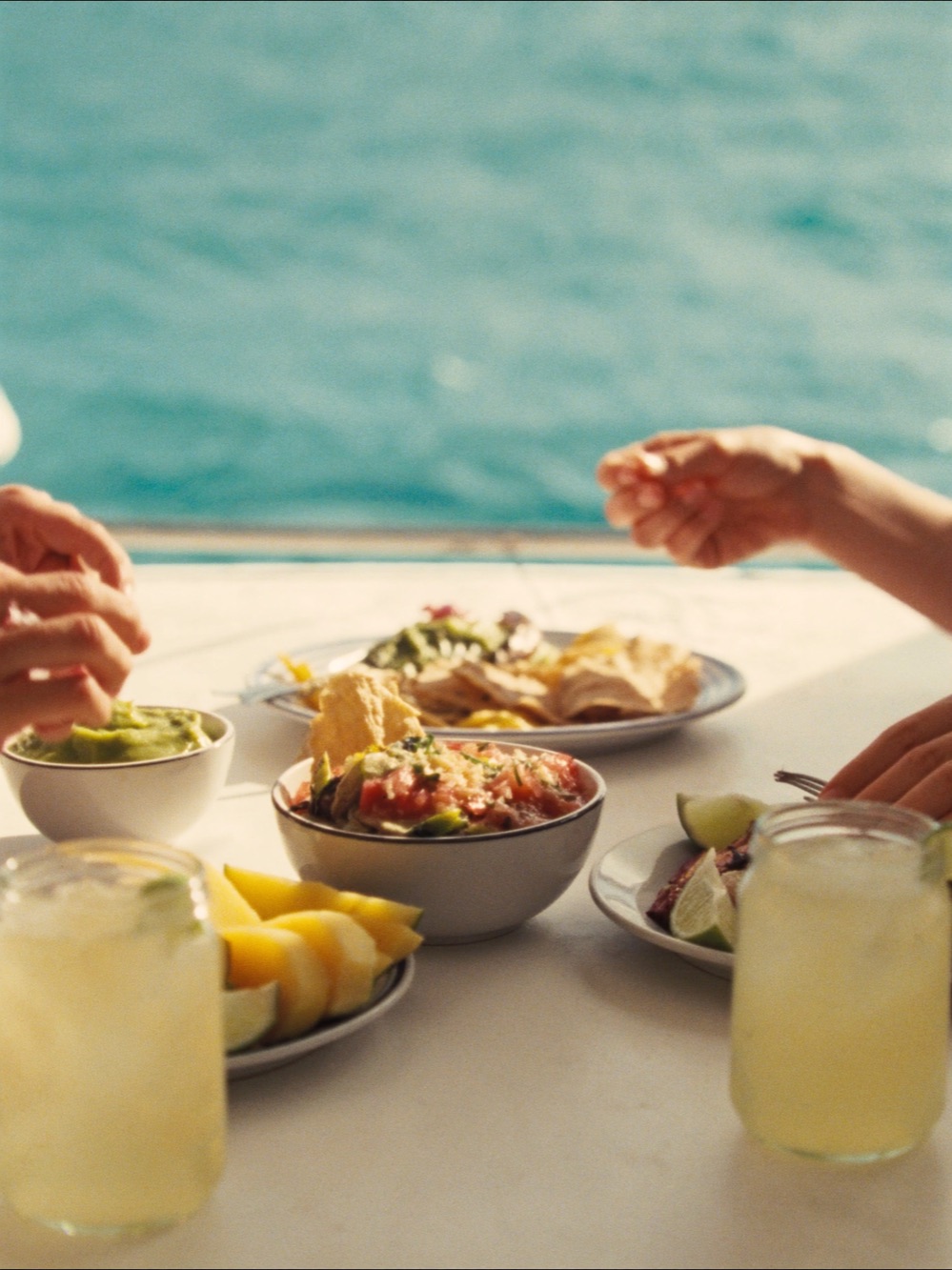 Fresh ceviche, guacamole and margaritas served on board
