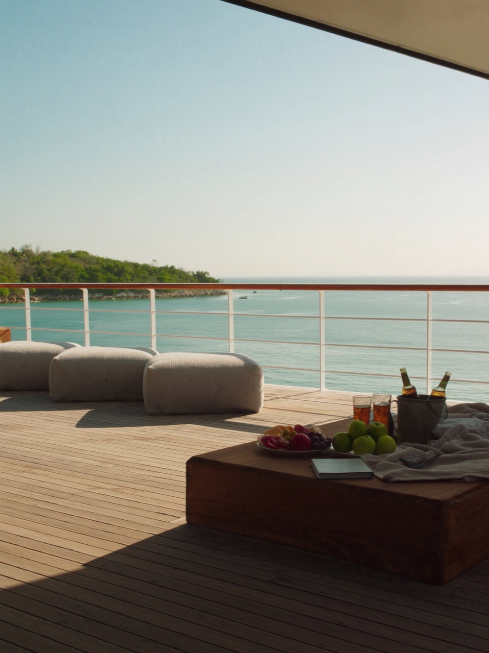 Private yacht deck with drinks and fresh fruit overlooking Banderas Bay